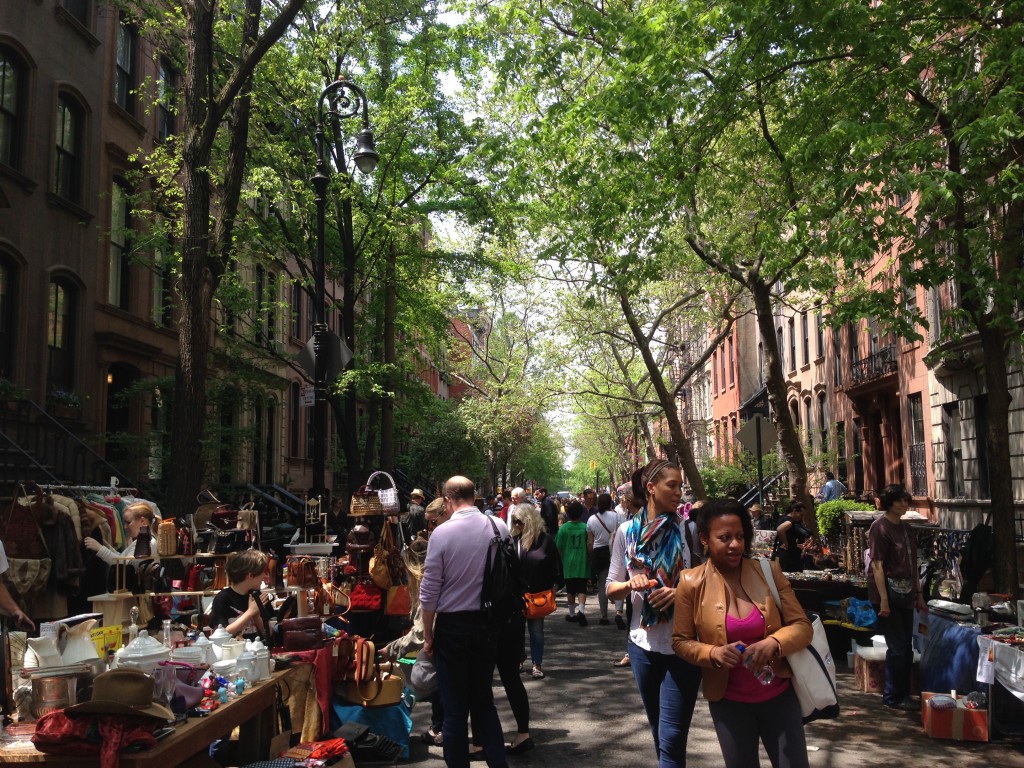 It's a garage sale block party on the same street as Carrie Bradshaw's house from "Sex and the City".