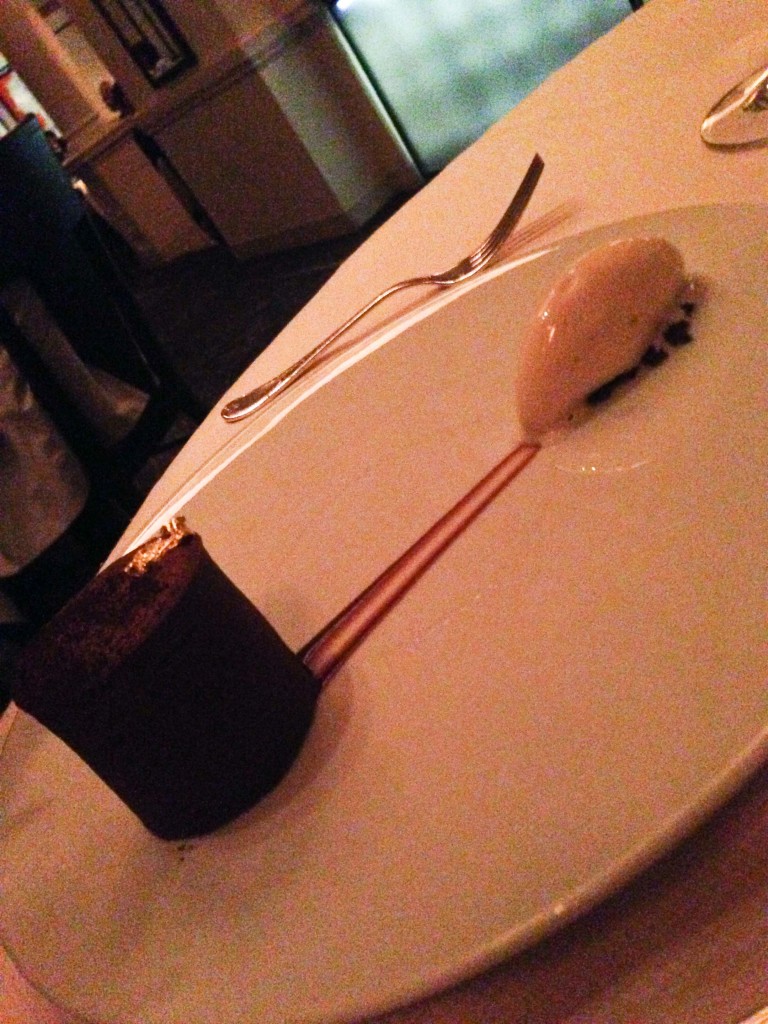 Daniel Dessert #1 - WARM GUANAJA CHOCOLATE COULANT  Liquid Caramel, Fleur de Sel, Milk Sorbet (a little white rat is trying to escape it, whilst relieving itself)