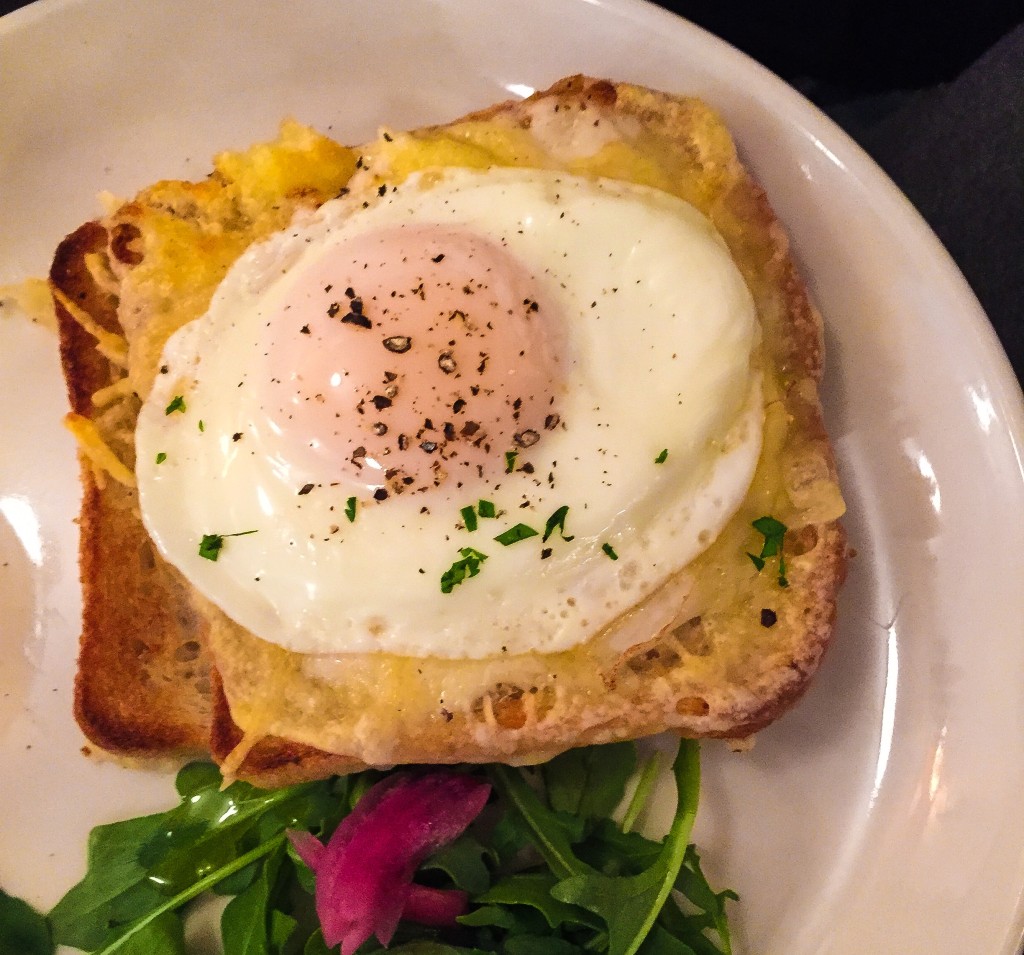 Madame Freda 14 — Pressed sandwich with duck prosciutto, cheddar béchamel, gruyere & a sunny side up egg