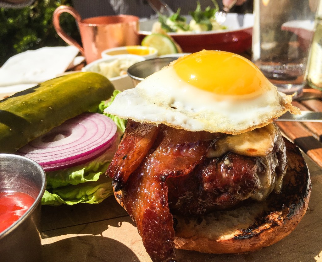 S+P dry aged Angus burger with Pennsylvania Havarti, maple bacon, a fried egg + fries $19