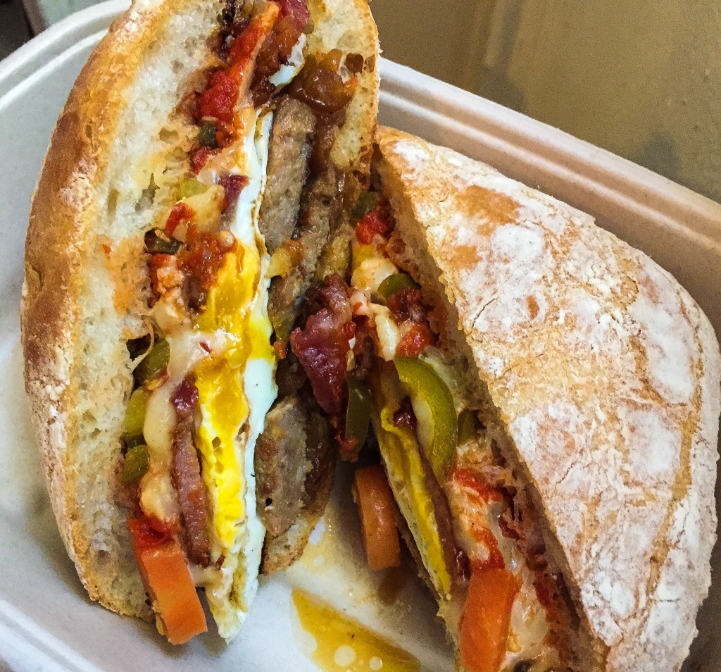 Mammoth - Eggs / Pork sausage / Smoked bacon / Pepper jack / Caramelized onions / Pickled jalapeños / Tomato compote / Ciabatta roll - $11.50