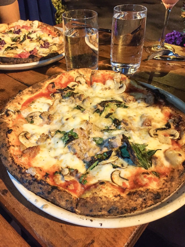 Boscaiola - $19 mozzarella / Italian sausage / gorgonzola / mushrooms / basil