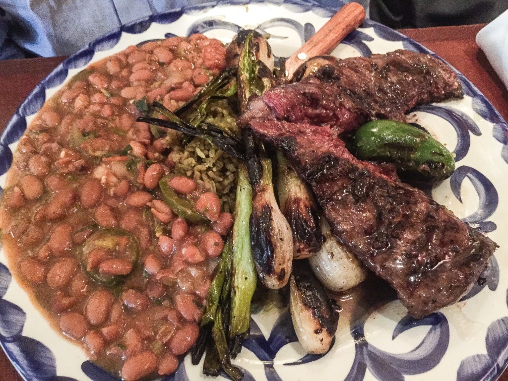 ARRACHERA AL TEQUILA CON JALAPEÑOS TORREADOS grilled skirt steak marinated in lime and tequila, char grilled onions and jalapeños, green rice, pinto beans 22.