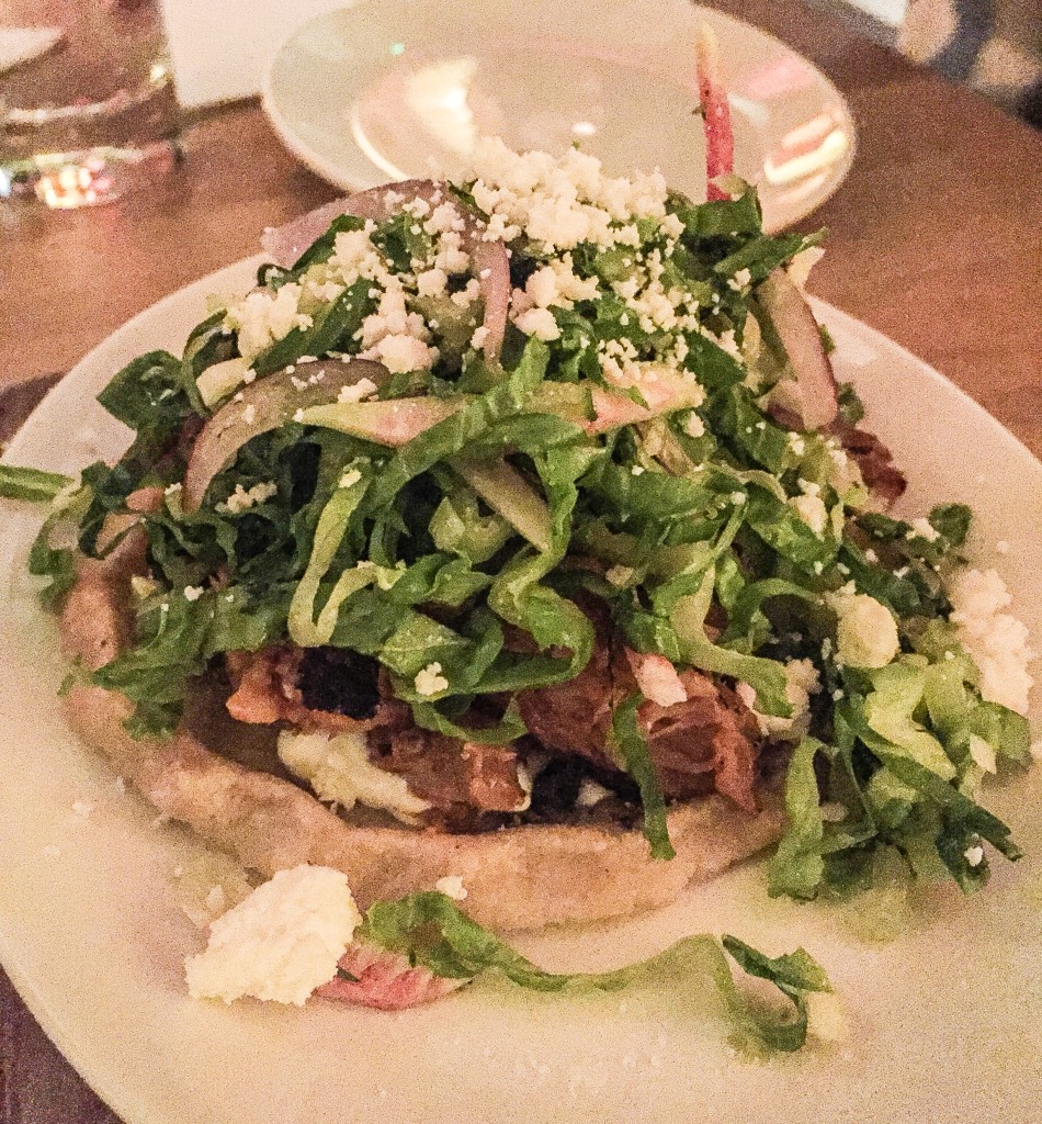 confit chicken on black bean sope w crema & queso fresco  $13