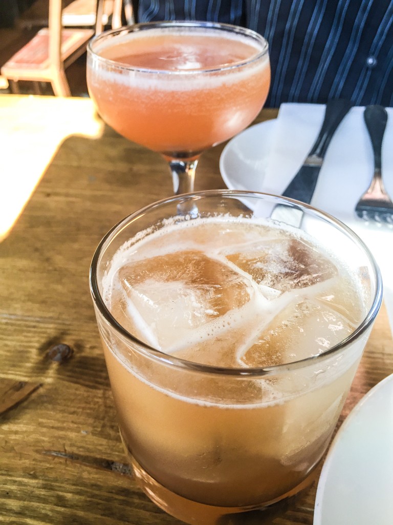 (Foreground) DUNE DECK - Rum, Luxardo Maraschino, lime, spiced grenadine 12 (Background) AUNTIE BLAYZE - Bourbon, orange liqueur, angostura bitters, citrus 11