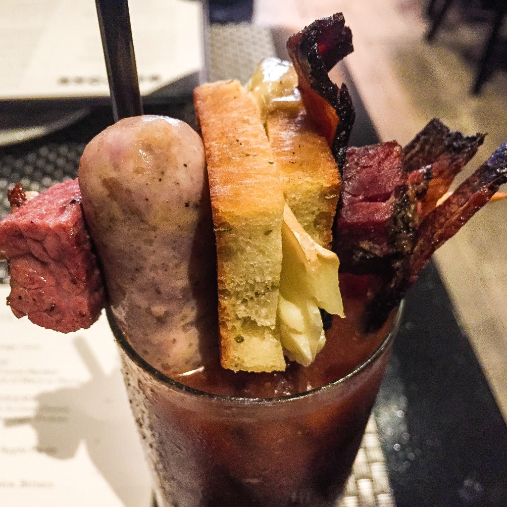 Mary's Walk of Shame - Bloody Mary topped with Grilled Cheese, Maple Bacon, Pastrami, Sausage & Pickles - $15