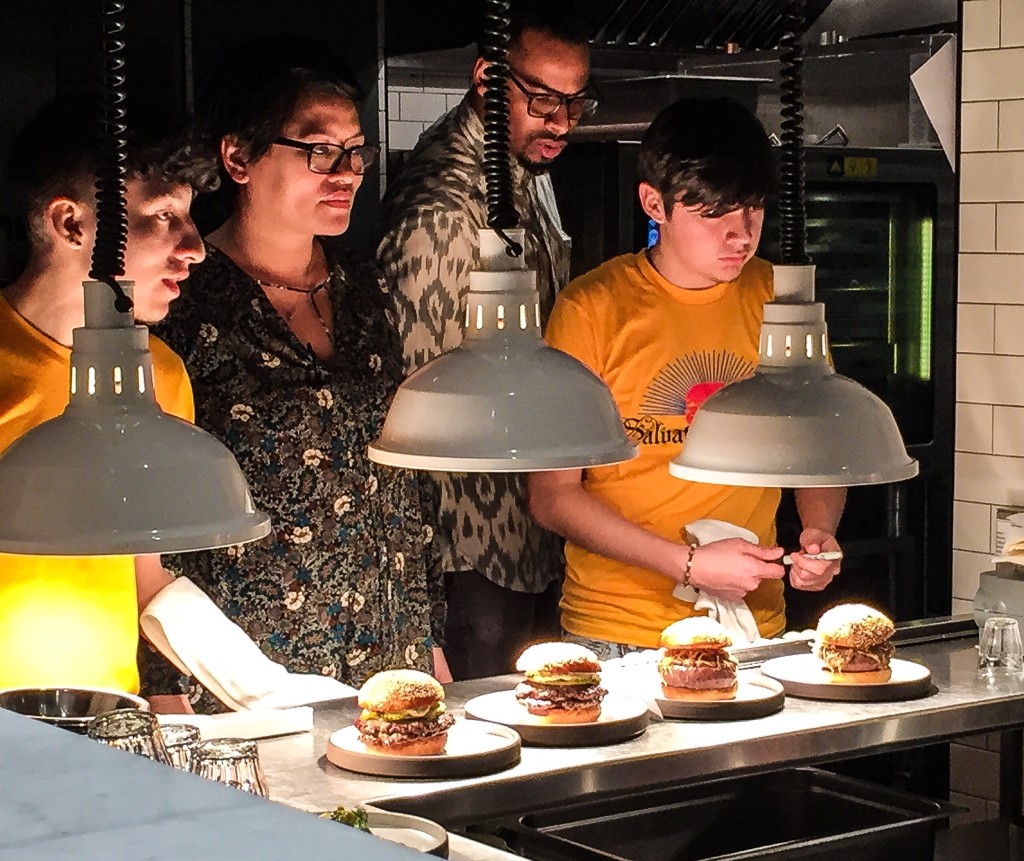 Burger Slaves entranced and beguiled by Mme. Bloomfield...