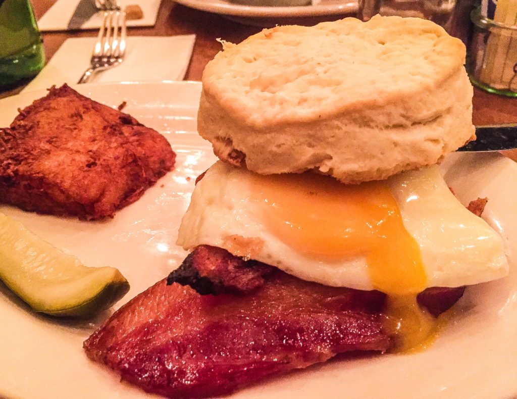 Buttermilk Biscuit Sandwich  bacon, fried egg, & cheddar cheese, with hash brown - $13