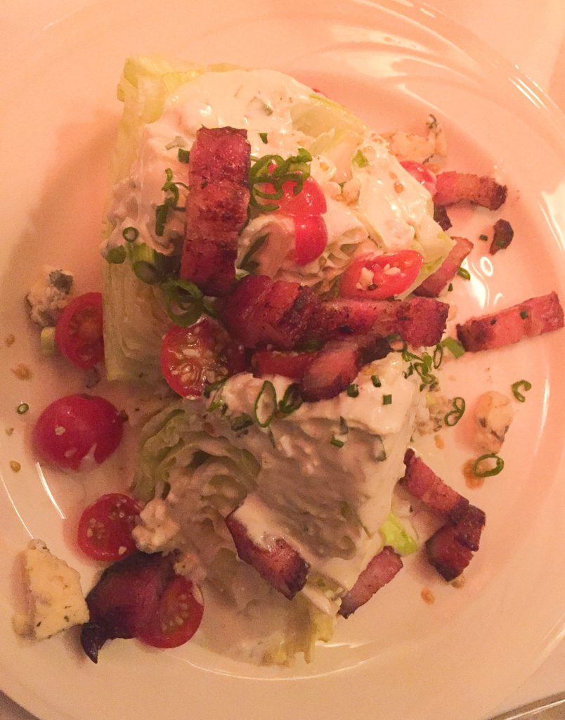 ceberg Lettuce Wedges, Blue Cheese Dressing  with Chopped Tomatoes and Bacon . . . add 4.00 $13