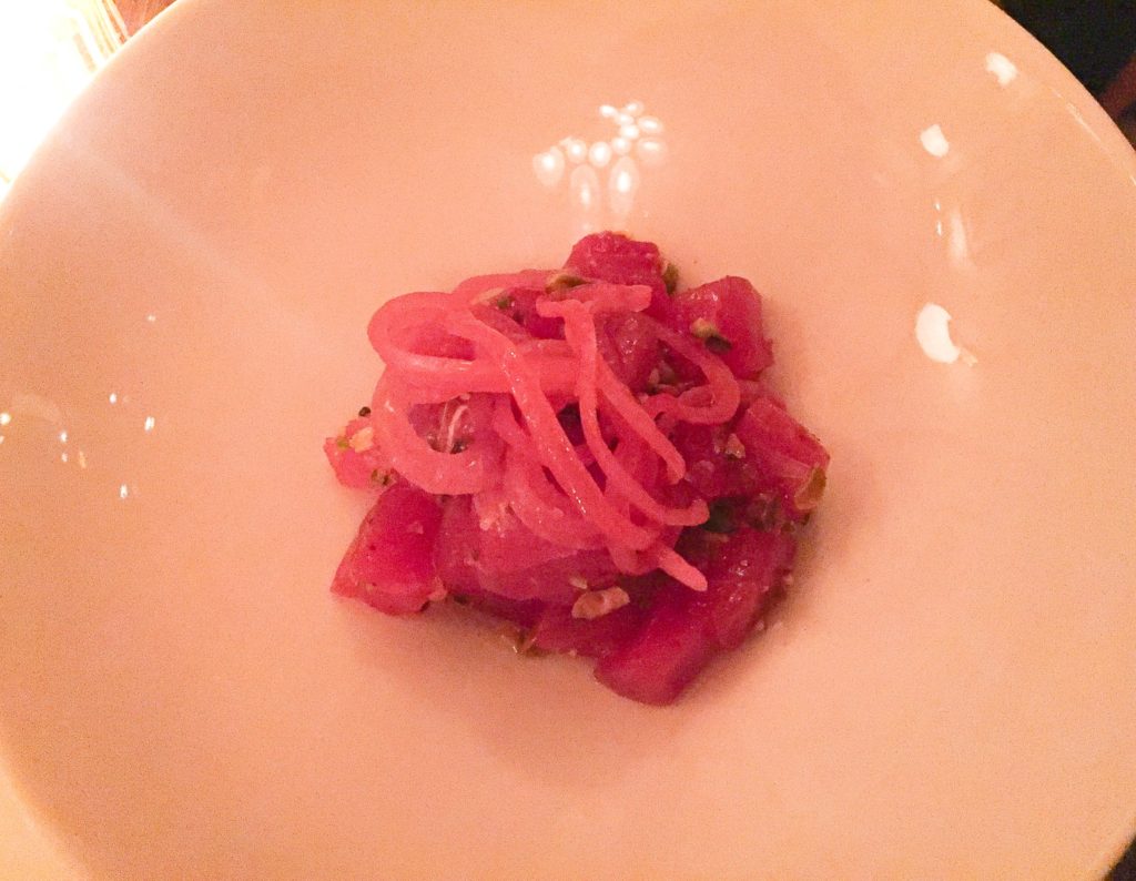 TUNA CRUDO oranges, pistachios, pickled red onion 19